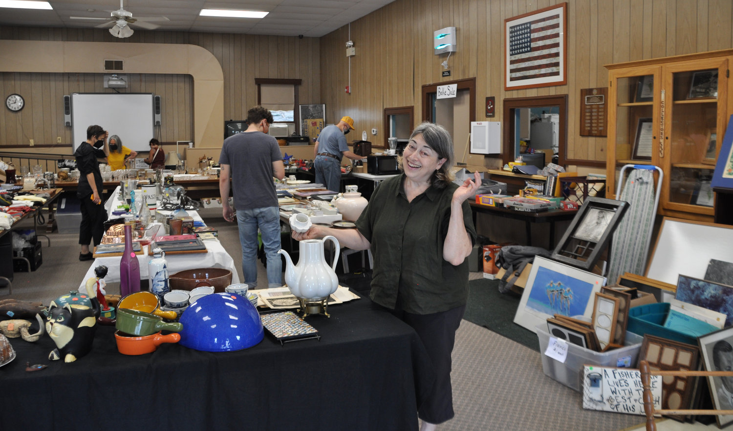 Sunshine Hall Library board member Leslie Rutkin lit up the Town Hall with her "happy face" at the Treasure and Trinket sale held in Eldred, NY last weekend benefiting the library
